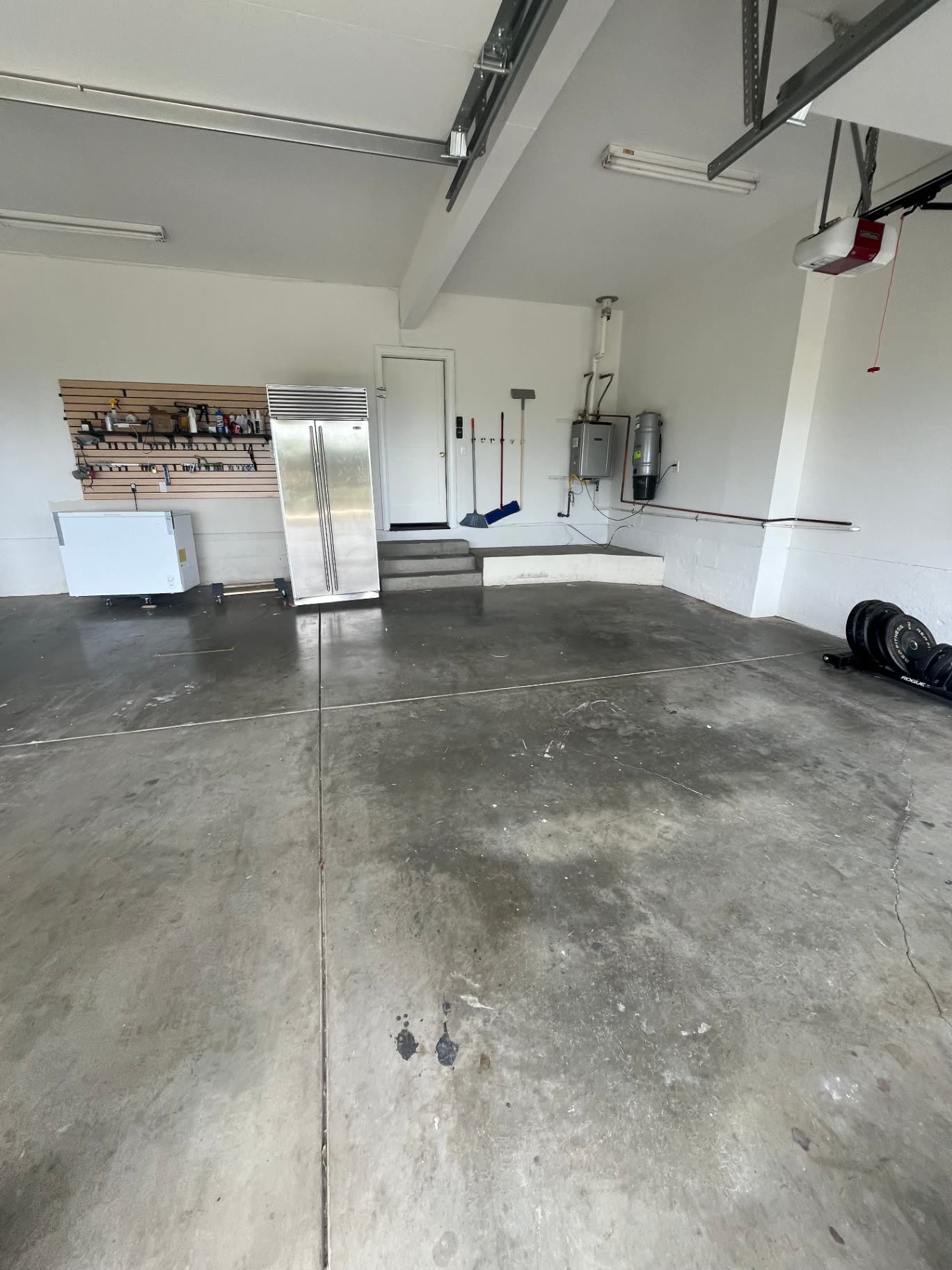 Bare concrete garage floor before epoxy coating in the Sacramento area